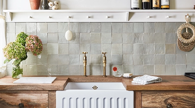 Zellige tile kitchen backsplash in light green